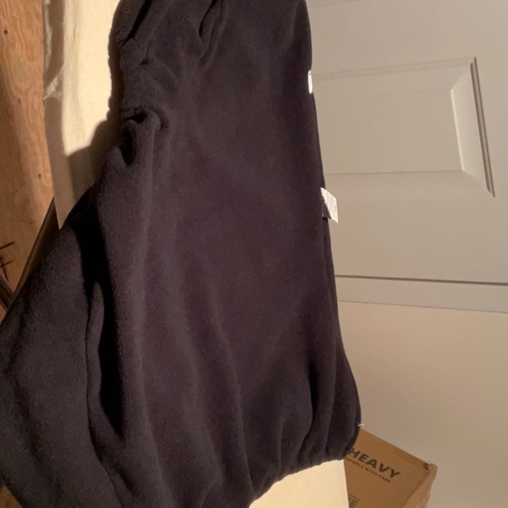 NWOT black fleece saddle cover.